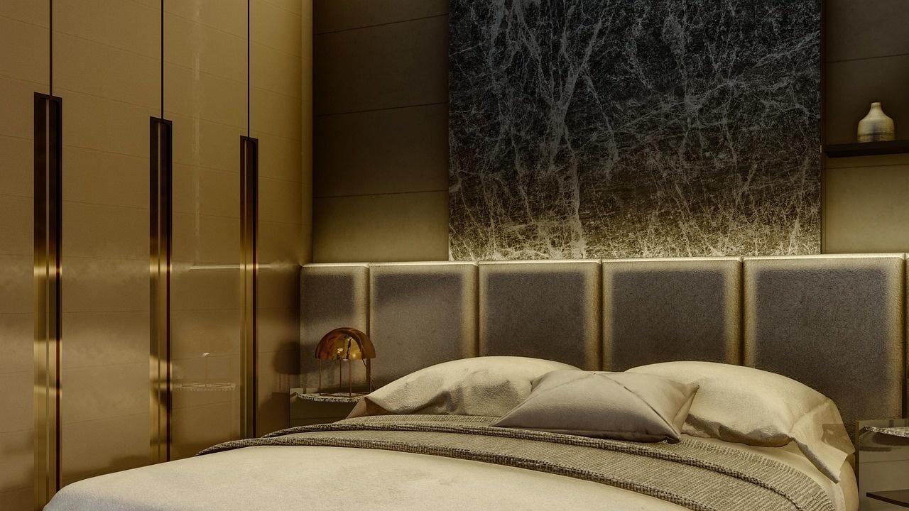Manor suite with dark marble, brass lighting and ivory linens at Hemlockcovemanor